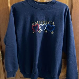 Womens blue “America” sweatshirt medium